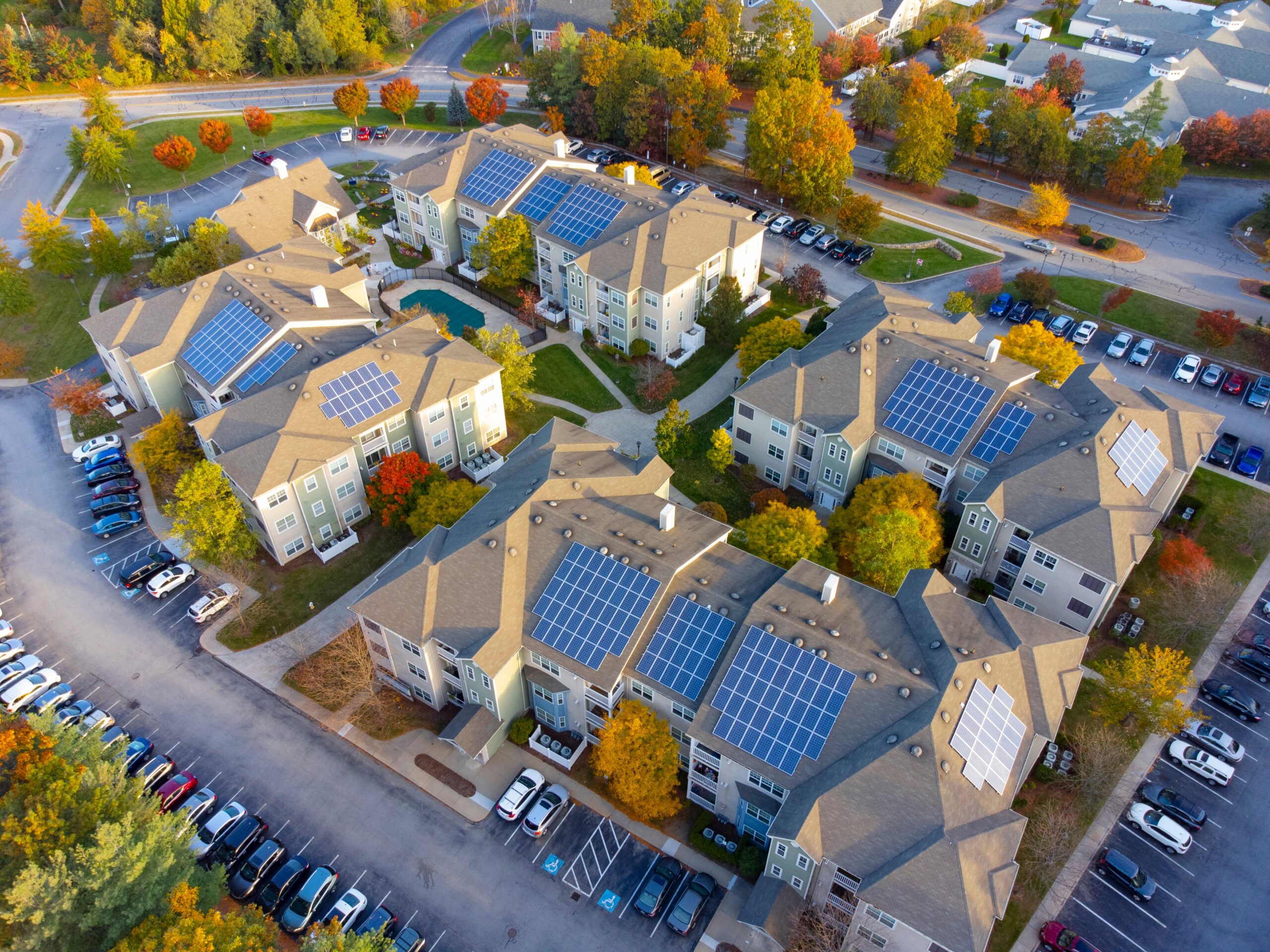 Aerial,View,Of,Apartment,Buildings,With,Solar,Panel,Installed,On